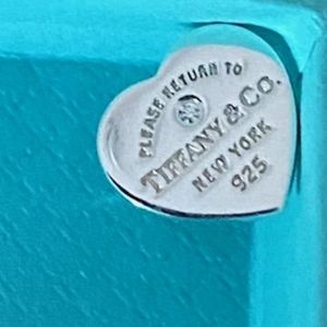Tiffany and Co. Diamond heart earrings